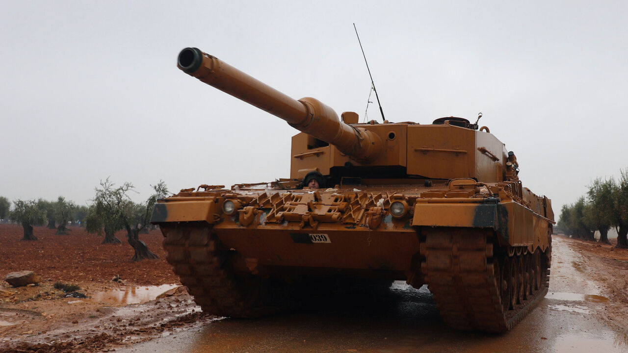 MIDEAST-CRISIS/SYRIA-TURKEY A Turkish military tank is seen near Mount Barsaya, northeast of Afrin, Syria January 23, 2018. REUTERS/Khalil Ashawi - RC17EC8A27B0