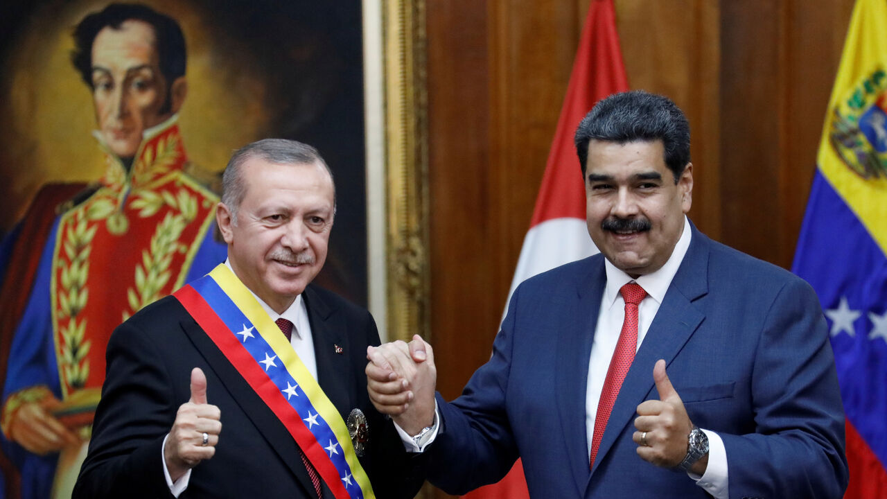 Turkish President Tayyip Erdogan and Venezuela's President Nicolas Maduro attend an agreement-signing ceremony in Caracas Turkish President Tayyip Erdogan and Venezuela's President Nicolas Maduro attend an agreement-signing ceremony between Turkey and Venezuela at Miraflores Palace in Caracas, Venezuela December 3, 2018. REUTERS/Manaure Quintero - RC1A1B7C8000