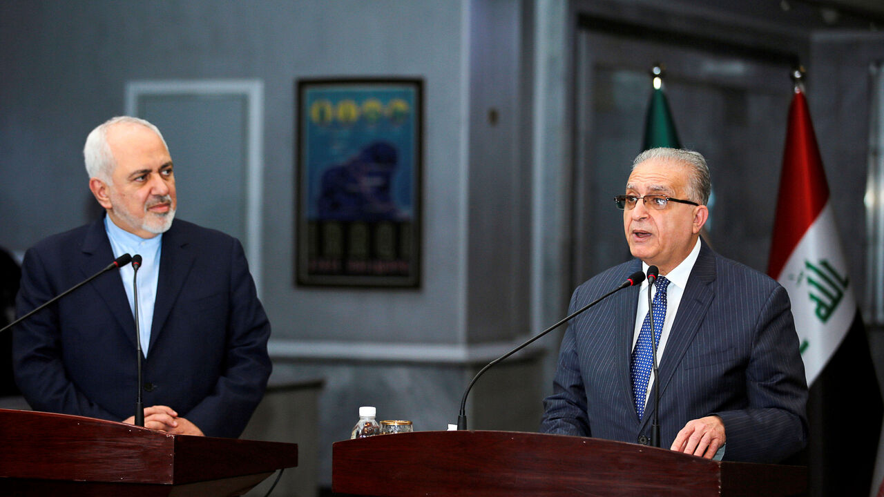Iraqi Foreign Minister Mohamed Ali Alhakim speaks with his Iranian counterpart Mohammad Javad Zarif during news conference, in Baghdad Iraqi Foreign Minister Mohamed Ali Alhakim speaks with his Iranian counterpart Mohammad Javad Zarif during news conference, in Baghdad, Iraq January 13, 2019. REUTERS/Khalid Al-Mousily - RC17491CB760