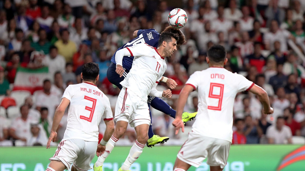 SOCCER-ASIANCUP-IRN-JPN/ Soccer Football - AFC Asian Cup - Semi-Final - Iran v Japan - Hazza Bin Zayed Stadium, Al Ain, United Arab Emirates - January 28, 2019 Iran's Vahid Amiri in action with Japan's Hiroki Sakai REUTERS/Suhaib Salem - RC18FD209230