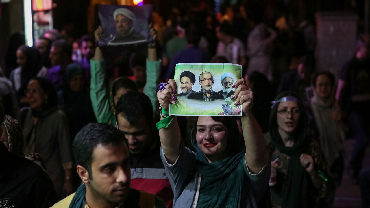 Supporters of Iranian president Hassan Rouhani celebrate his victory in the presidential election in Tehran Supporters of Iranian president Hassan Rouhani celebrate his victory in the presidential election in Tehran, Iran, May 20, 2017. TIMA via REUTERS ATTENTION EDITORS - THIS IMAGE WAS PROVIDED BY A THIRD PARTY. FOR EDITORIAL USE ONLY. TPX IMAGES OF THE DAY - RC1B70C1D340