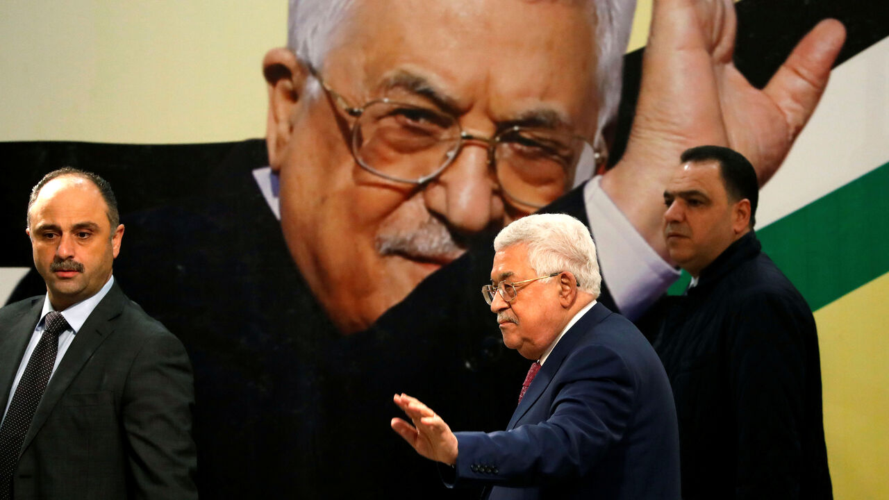 PALESTINIANS-POLITICS/ Palestinian President Mahmoud Abbas gestures during a ceremony marking the 54th anniversary of Fatah's founding, in Ramallah, in the Israeli-occupied West Bank December 31, 2018. REUTERS/Mohamad Torokman - RC1510C8D980