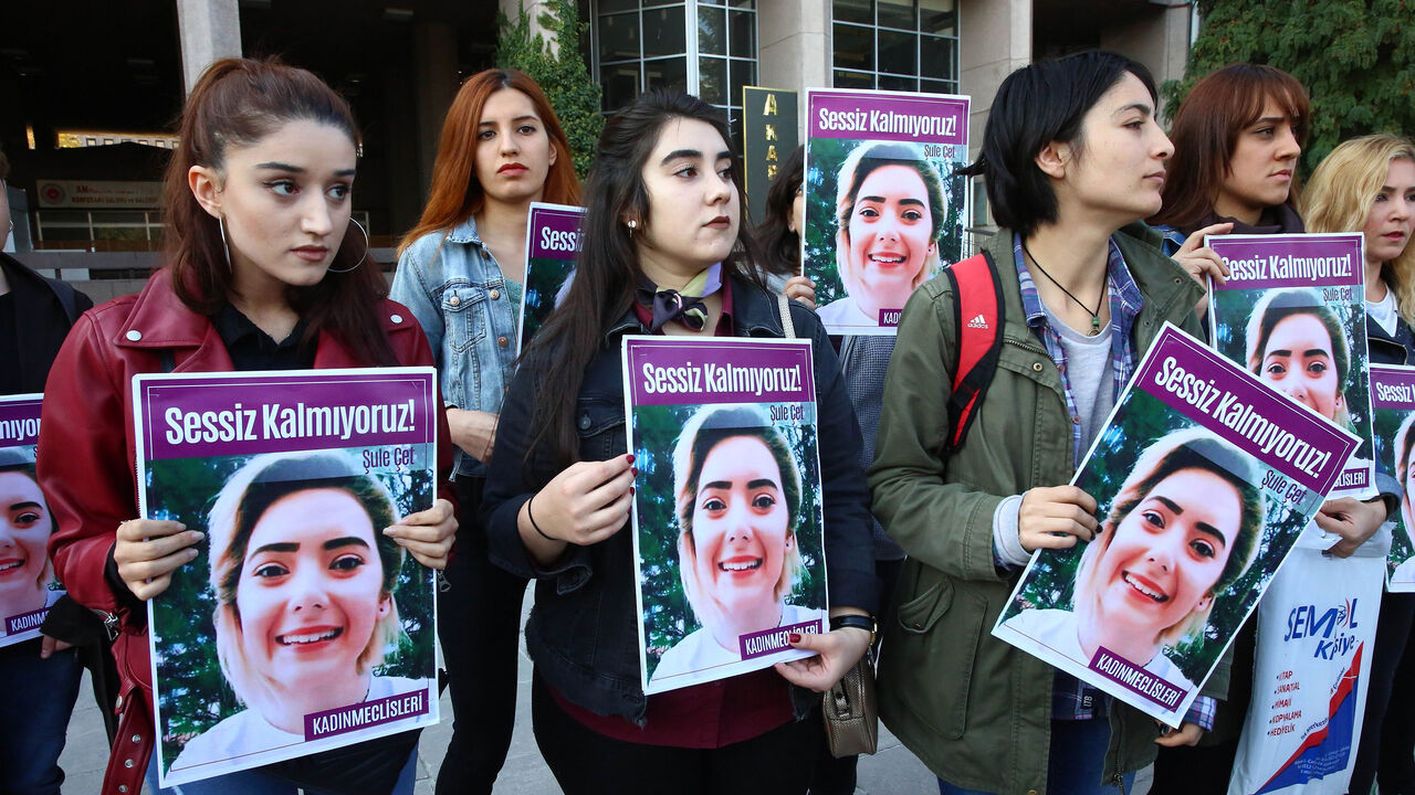 AFP_1AO35G Women protest femicide before the trial regarding the death of Sule Cet, who was allegedly killed by being thrown off the 20th floor of a luxury building in Ankara, on November 8, 2018. (Photo by ADEM ALTAN / AFP) (Photo credit should read ADEM ALTAN/AFP/Getty Images)