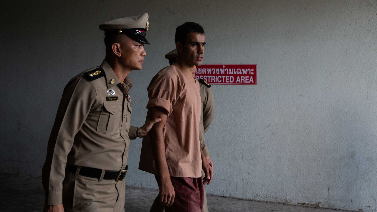 775292051LD006_Refugee_Foot BANGKOK, THAILAND - FEBRUARY 04: The departure of Hakeem al-Araibi, a refugee footballer, from Bangkok's Criminal Court on February 4, 2019 in Bangkok, Thailand. The Thai court is hearing the request to extradite the Bahraini football player, who was detained in Bangkok during his honeymoon. (Photo by Lauren DeCicca/Getty Images)