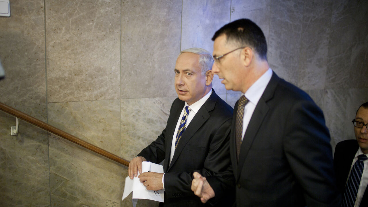 71057695 JERUSALEM, ISRAEL - AUGUST 26: Israeli Prime Minister Benjamin Netanyahu speaks to Israeli education minister Gideon Saar (R) as they arrive for the weekly cabinet meeting in his offices on August 26, 2012 in Jerusalem, Israel. (Photo by Uriel Sinai/Getty Images)
