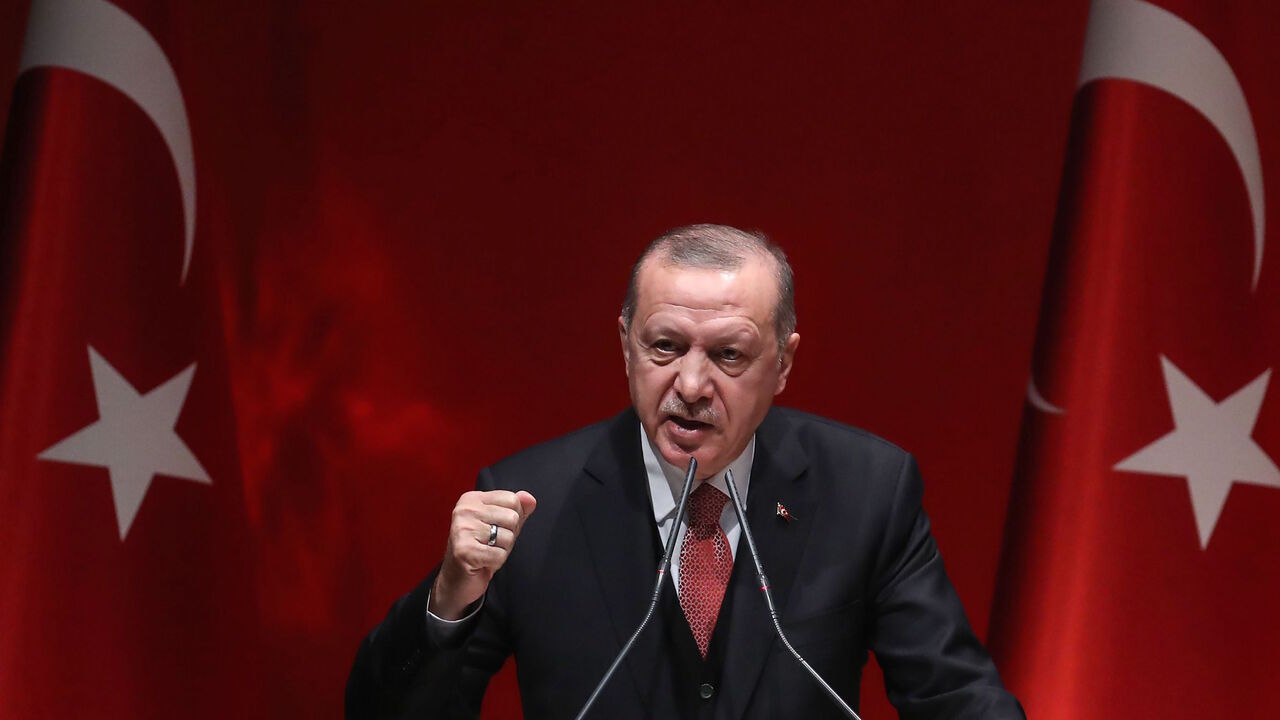 AFP_1CT0XS Turkish President Recep Tayyip Erdogan addresses a meeting of provincial election officials at the headquarters of his ruling Justice and Development (AK) Party in Ankara on January 29, 2019. (Photo by Adem ALTAN / AFP) (Photo credit should read ADEM ALTAN/AFP/Getty Images)