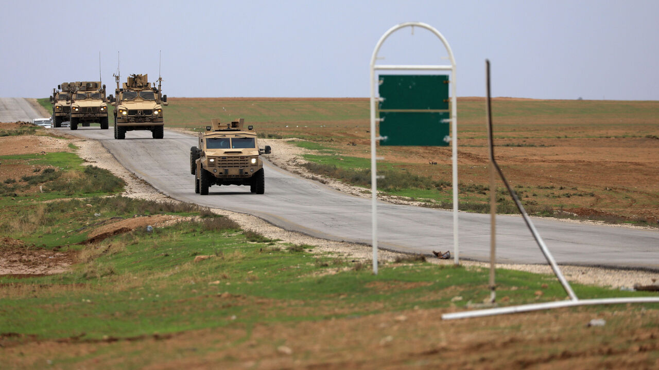MIDEAST-CRISIS/SYRIA-TURKEY U.S. troops patrol near Turkish border in Hasakah, Syria, November 4, 2018. REUTERS/Rodi Said - RC1F4F72F170