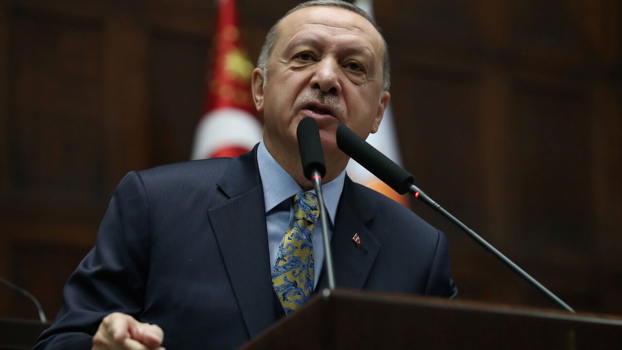MIDEAST-CRISIS/SYRIA-TURKEY-USA Turkish President Tayyip Erdogan addresses members of parliament from his ruling AK Party (AKP) during a meeting at the Turkish parliament in Ankara, Turkey, January 15, 2019. REUTERS/Umit Bektas - RC1EDE066F60