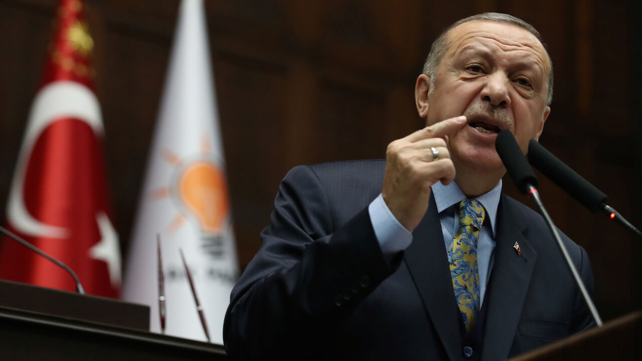 MIDEAST-CRISIS/SYRIA-TURKEY-USA Turkish President Tayyip Erdogan addresses members of parliament from his ruling AK Party (AKP) during a meeting at the Turkish parliament in Ankara, Turkey, January 15, 2019. REUTERS/Umit Bektas - RC196AEB3320