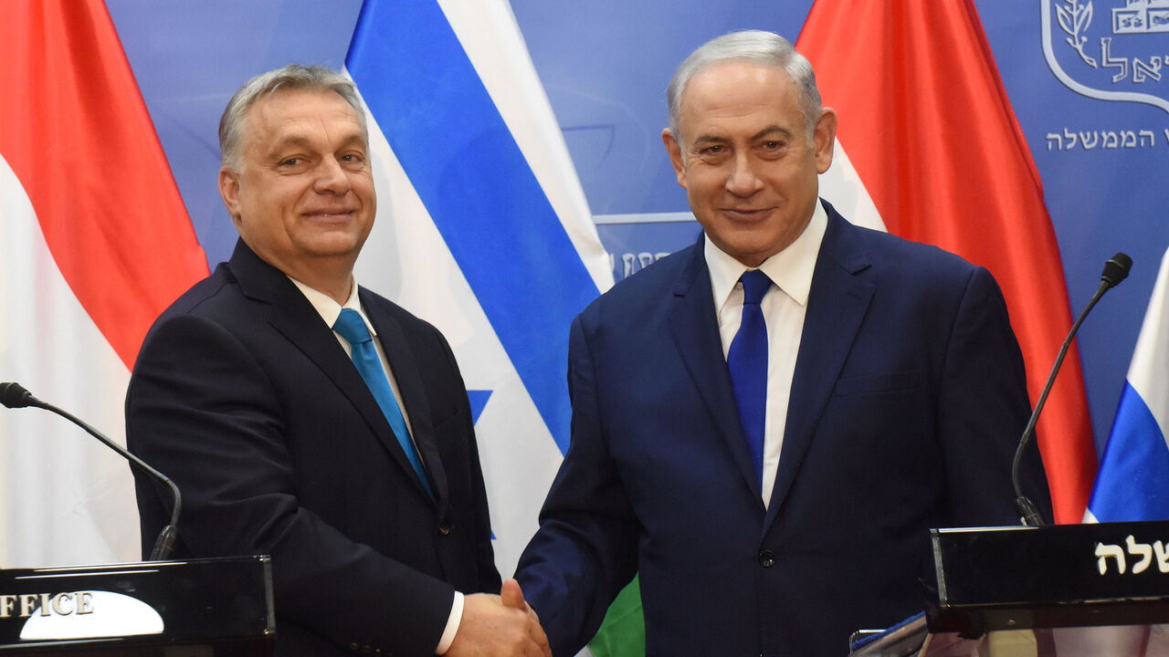 ISRAEL-HUNGARY/ORBAN-NETANYAHU Hungarian Prime Minister Viktor Orban shakes hands with Israeli Prime Minister Benjamin Netanyahu during a joint statment, at the prime minister's office in Jerusalem, July 19, 2018. Debbie Hill/Pool via Reuters - RC13F129AE70
