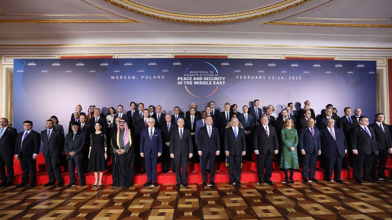 MIDEAST-CRISIS/SUMMIT Participants pose for family photo at the Middle East conference at the Royal Castle in Warsaw, Poland, February 13, 2019. Agencja Gazeta/Slawomir Kaminski via REUTERS ATTENTION EDITORS - THIS IMAGE WAS PROVIDED BY A THIRD PARTY. POLAND OUT. NO COMMERCIAL OR EDITORIAL SALES IN POLAND. - RC1299354D40
