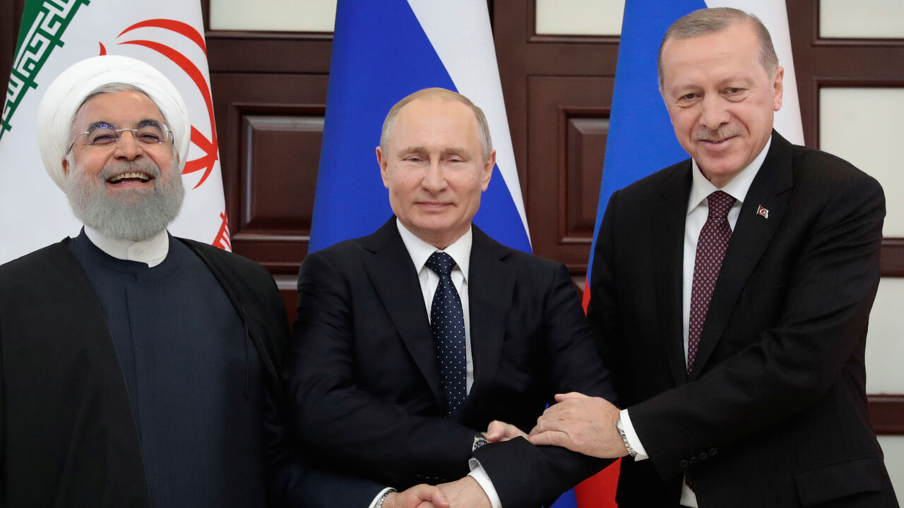 MIDEAST-CRISIS/RUSSIA-TURKEY-IRAN Iranian President Hassan Rouhani, Russian President Vladimir Putin and Turkish President Recep Tayyip Erdogan meet in the Black sea resort of Sochi, Russia, 14 February 2019. Sergei Chirikov/Pool via REUTERS - RC1B409F5F40