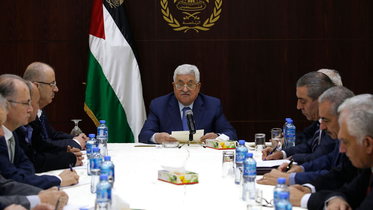 AFP_1AV11D Palestinian president Mahmoud Abbas chairs a meeting of the Palestine Liberation Organization (PLO) Executive Committee at the Palestinian Authority headquarters in the West Bank city of Ramallah on November 15, 2018. (Photo by ABBAS MOMANI / AFP) (Photo credit should read ABBAS MOMANI/AFP/Getty Images)
