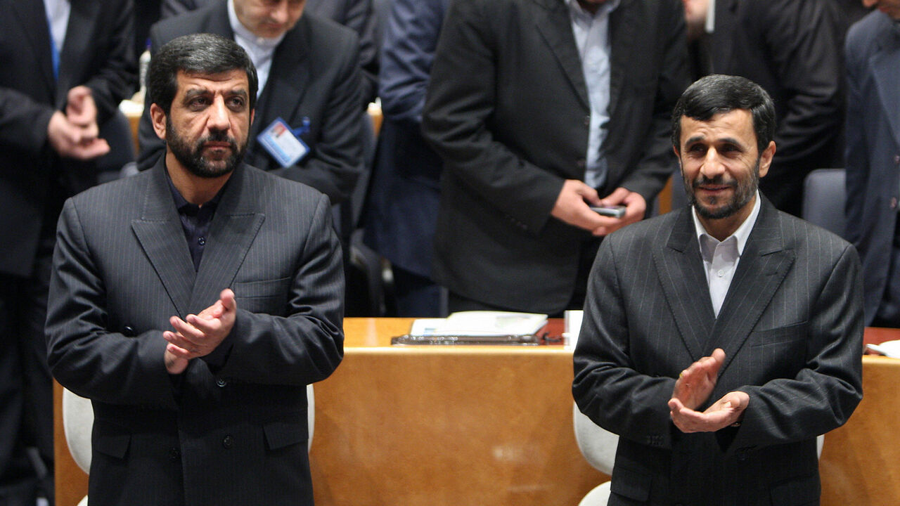 Nic206346 Iranian President Mahmoud Ahmadinejad (R) and head of Iran TV, Ezzatollah Zarghami, (L) applaud as they attend the 44th General assembly of the Asia-Pacific Broadcaasting Union in Tehran 03 November 2007. AFP PHOTO/ATTA KENARE (Photo credit should read ATTA KENARE/AFP/Getty Images)