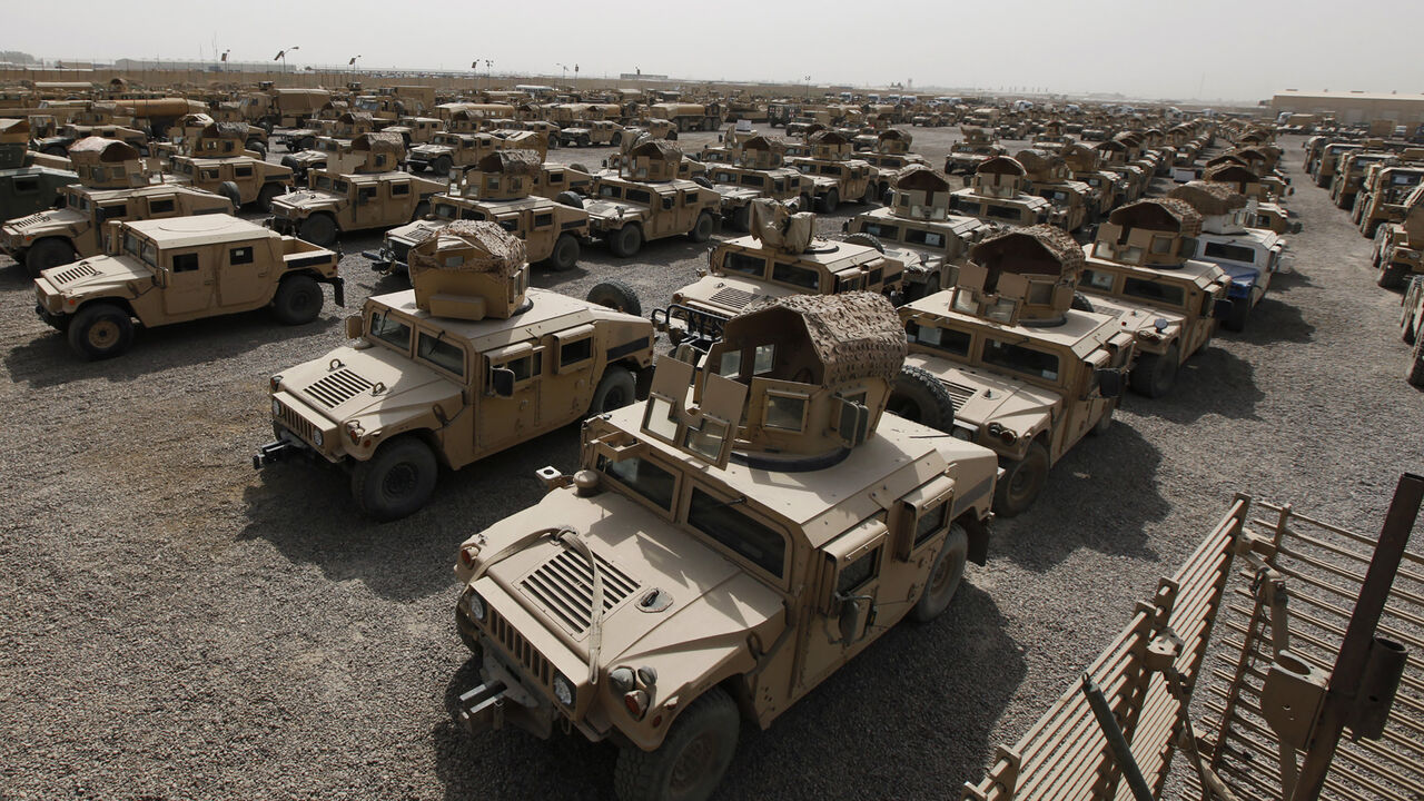 IRAQ/ A view of humvees parked at a courtyard at Camp Liberty in Baghdad September 30, 2011. U.S troops are scheduled to pull out of the country by the end of this year, according to a 2008 security pact between the U.S. and Iraq. Picture taken September 30, 2011. REUTERS/Mohammed Ameen (IRAQ - Tags: CONFLICT MILITARY POLITICS) - GM1E7A11FAJ01