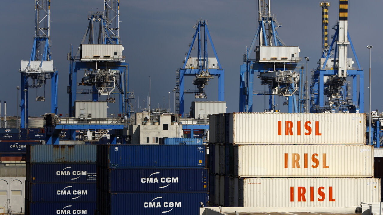 IRAN/SMUGGLING Empty and disused Islamic Republic of Iran Shipping Lines (IRISL Group) containers are seen at Malta Freeport in the Port of Marsaxlokk outside Valletta February 10, 2012. The IRISL ships and containers are key parts in an international cat-and-mouse game: Iran's attempt to evade the trade sanctions tightening around it. Washington and European capitals want to stop or slow Iran's nuclear programme. They believe that IRISL, which moves nearly a third of Iran's exports and imports and is central to the coun