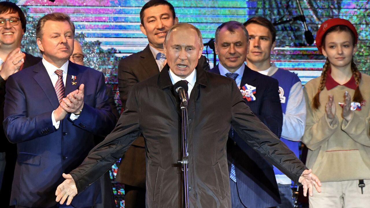 UKRAINE-CRISIS/CRIMEA-PUTIN Russian President Vladimir Putin addresses the crowd during a concert marking the fifth anniversary of Russia's annexation of Crimea, in Simferopol March 18, 2019. Yuri Kadobnov/Pool via REUTERS - RC1E8C97C900