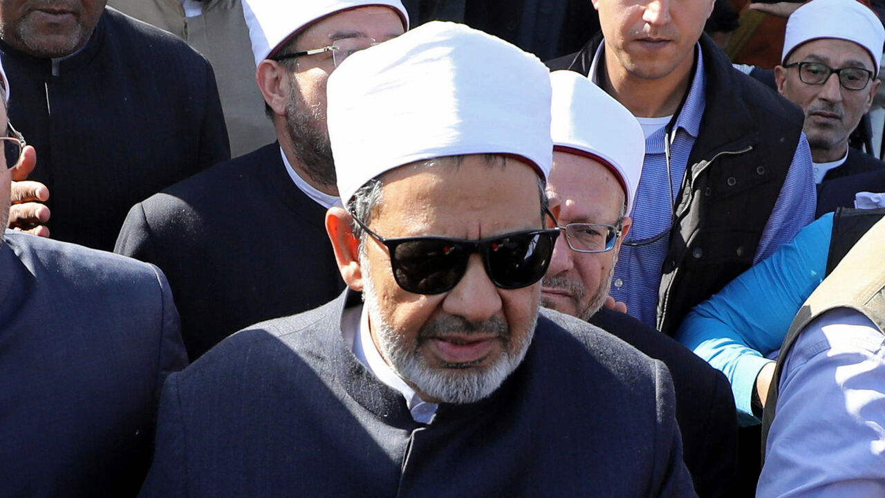 Grand Imam of al-Azhar, Sheikh Ahmed al-Tayeb leaves Al Rawdah mosque during the first Friday prayer after the attack in Bir Al-Abed, Egypt, December 1, 2017. Picture taken December 1, 2017. REUTERS/Mohamed Abd El Ghany - RC170C5C7C20