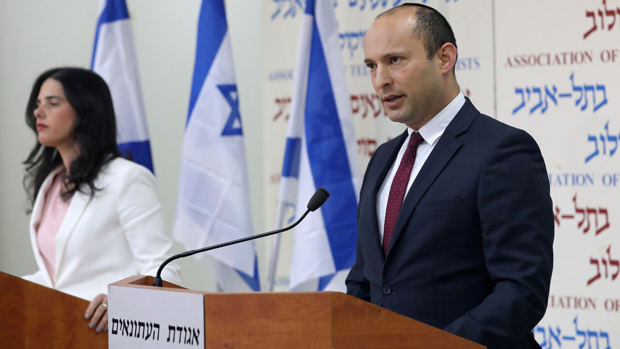 ISRAEL-ELECTION/NATIONALISTS Israeli Education Minister Naftali Bennett (R) and Justice Minister Ayelet Shaked, from the Jewish Home party, deliver statements in Tel Aviv, Israel December 29, 2018. REUTERS/Corinna Kern - RC15EB02E090