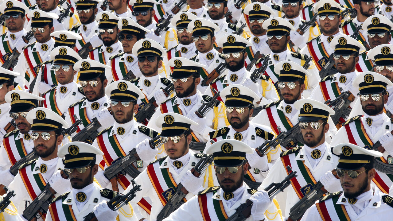 Members of the Iranian Revolutionary Guard Navy march during parade to commemorate anniversary of Iran-Iraq war, in Tehran EDITORS' NOTE: Reuters and other foreign media are subject to Iranian restrictions on their ability to report, film or take pictures in Tehran.
Members of the Iranian Revolutionary Guard Navy march during a parade to commemorate the anniversary of the Iran-Iraq war (1980-88), in Tehran September 22, 2011. REUTERS/Stringer (IRAN - Tags: POLITICS MILITARY ANNIVERSARY) - GM1E79M1DAT01