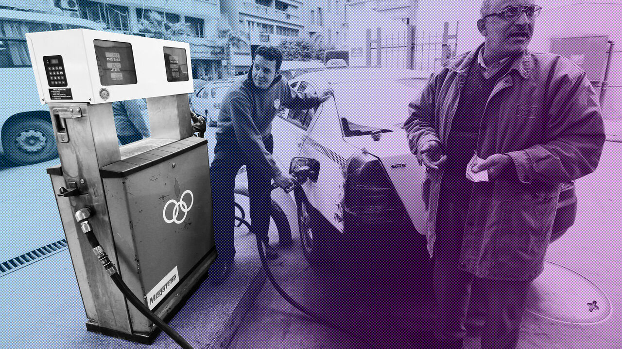 EGYPT/ An employee fills up a vehicle with fuel at a CO-OP petrol station in Cairo, January 13, 2015. Picture taken January 13, 2015. REUTERS/ Mohamed Abd El Ghany (EGYPT - Tags: TRANSPORT BUSINESS COMMODITIES ENERGY BUSINESS EMPLOYMENT SOCIETY) - LR2EB2A0ZWORP