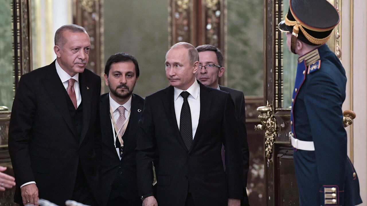 RUSSIA-TURKEY/ Russia's President Vladimir Putin (R, front) and his Turkish counterpart Tayyip Erdogan (L, front) attend a session of the Russian-Turkish Cooperation Council in Moscow, Russia April 8, 2019. Sputnik/Alexei Nikolsky/Kremlin via REUTERS ATTENTION EDITORS - THIS IMAGE WAS PROVIDED BY A THIRD PARTY. - RC199AEEEE80