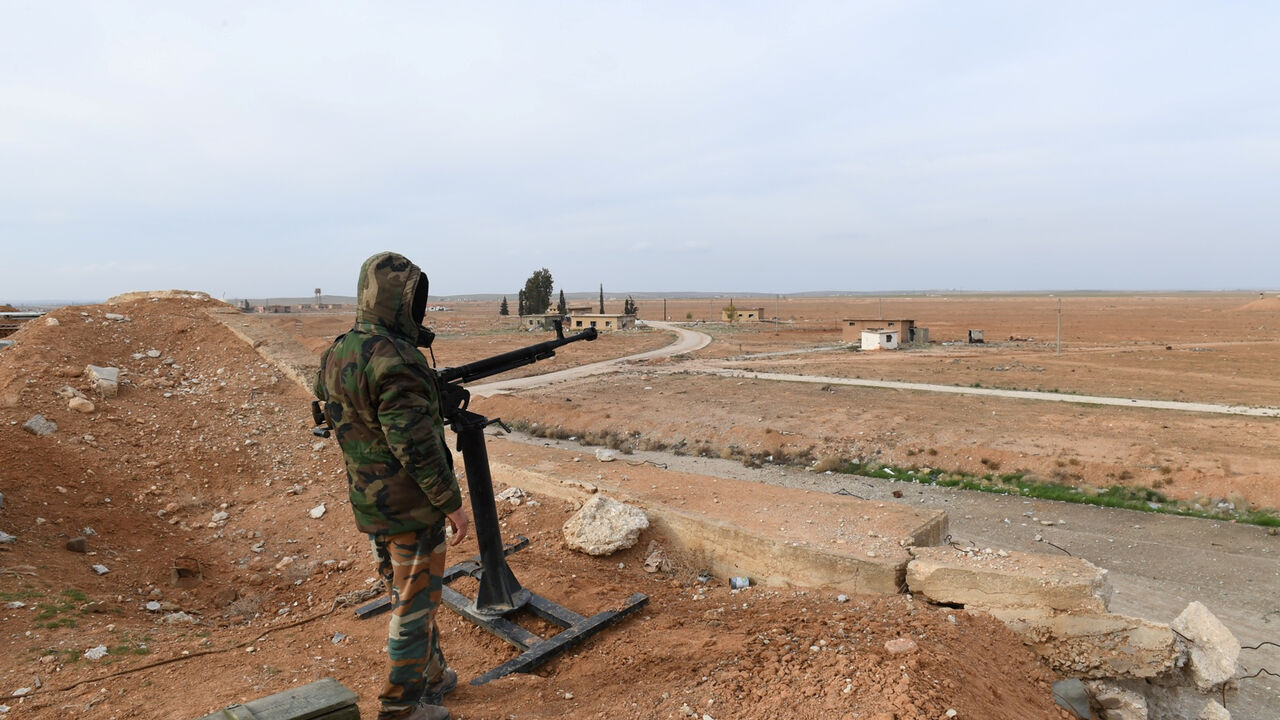 A Syrian Army soldier loyal to Syria's President Bashar al-Assad forces stands next to a military weapon in Idlib A Syrian Army soldier loyal to Syria's President Bashar al-Assad forces stands next to a military weapon in Idlib, Syria January 21, 2018. Picture taken January 21, 2018. SANA/Handout via REUTERS ATTENTION EDITORS - THIS PICTURE WAS PROVIDED BY A THIRD PARTY. REUTERS IS UNABLE TO INDEPENDENTLY VERIFY THE AUTHENTICITY, CONTENT, LOCATION OR DATE OF THIS IMAGE. - RC19C0D8B740