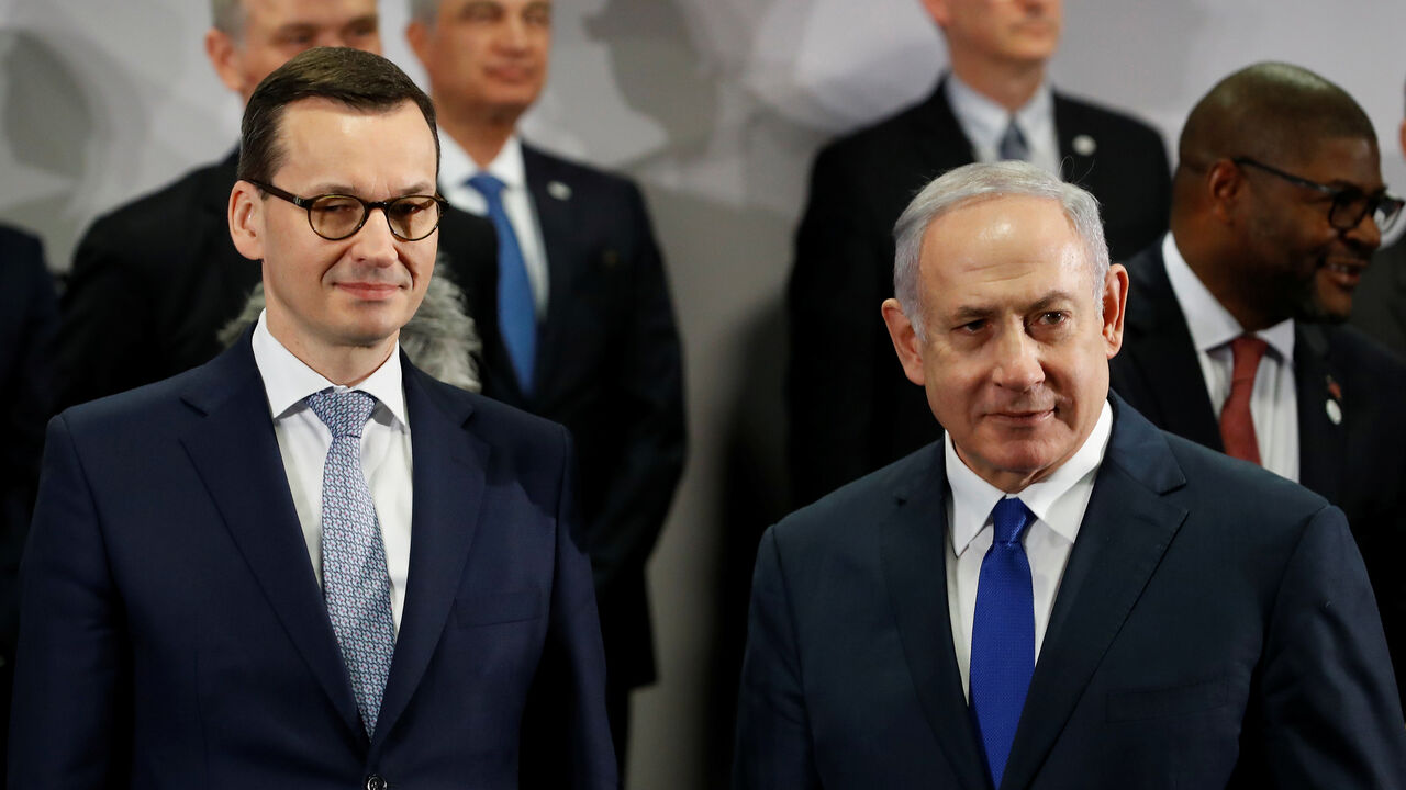 MIDEAST-CRISIS/SUMMIT Poland's Prime Minister Mateusz Morawiecki and Israel's Prime Minister Benjamin Netanyahu look on during the Middle East summit in Warsaw, Poland, February 14, 2019. REUTERS/Kacper Pempel - RC1695A9F040