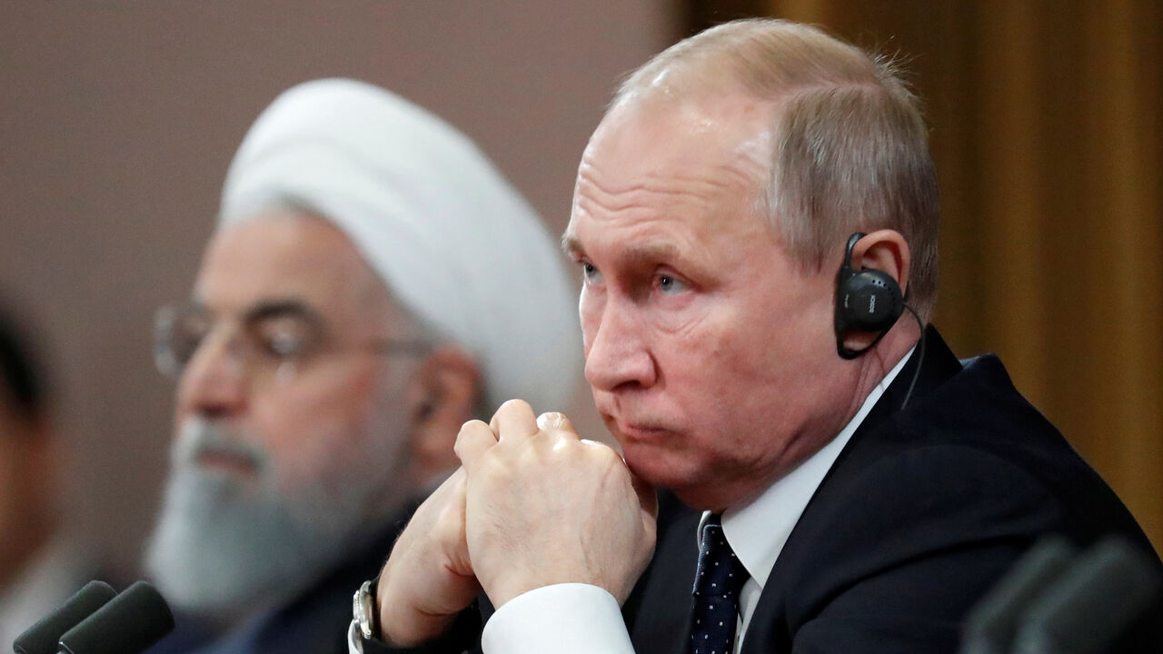 MIDEAST-CRISIS/RUSSIA-TURKEY-IRAN Russian President Vladimir Putin and Iranian President Hassan Rouhani attend a news conference, after a meeting in the Black sea resort of Sochi, Russia, 14 February 2019. Sergei Chirikov/Pool via REUTERS - RC158EB139B0
