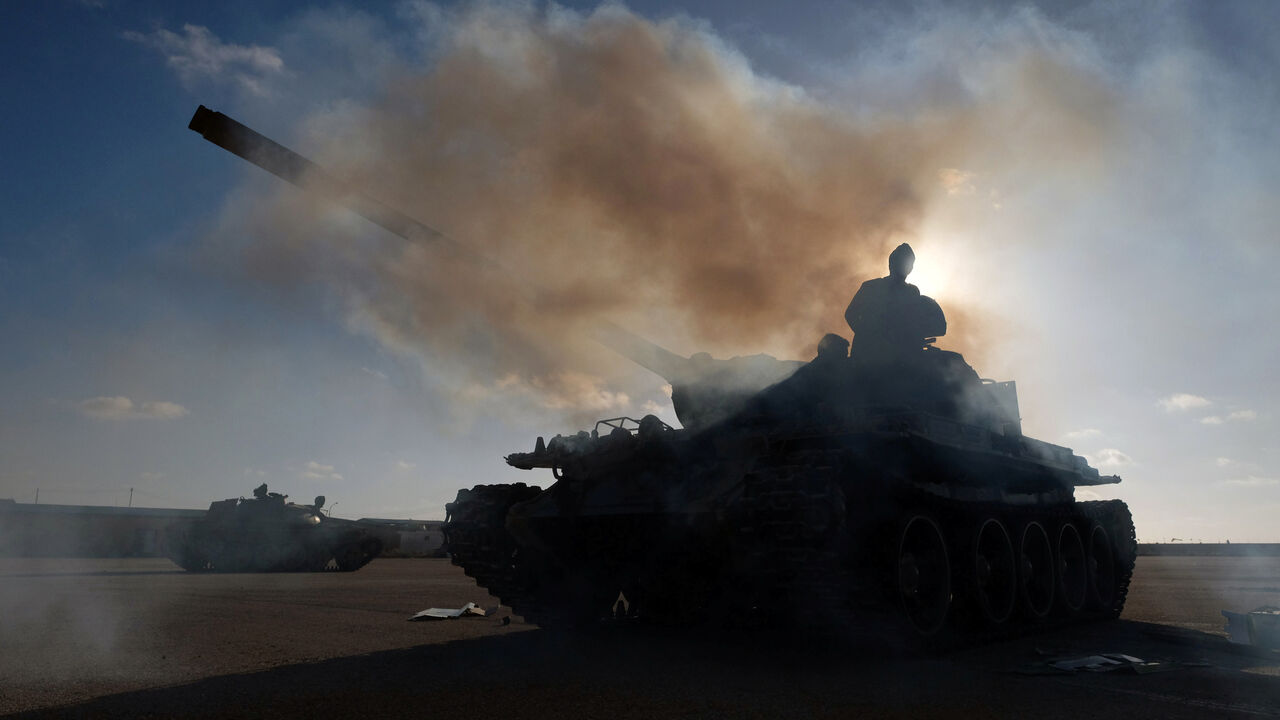 LIBYA-SECURITY/ Members of Libyan National Army (LNA) commanded by Khalifa Haftar, get ready before heading out of Benghazi to reinforce the troops advancing to Tripoli, in Benghazi, Libya April 13, 2019. REUTERS/Esam Omran Al-Fetori - RC1B9C0FEEB0