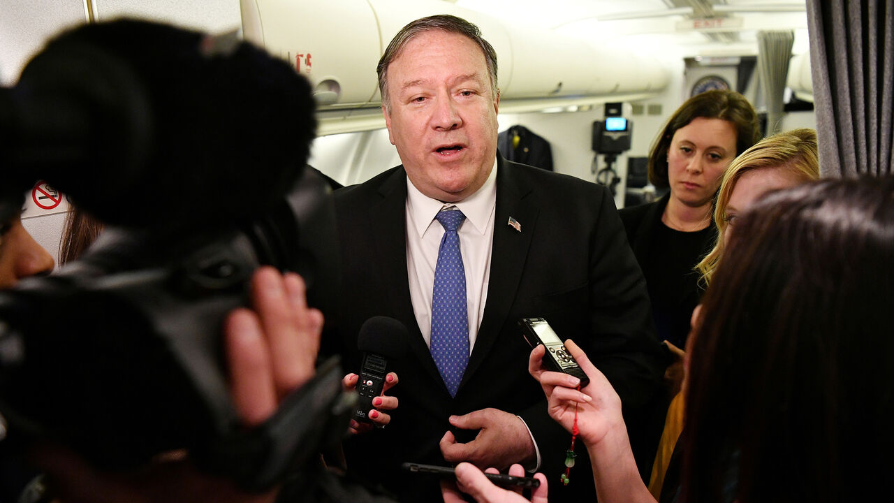 USA-IRAQ/POMPEO-VISIT U.S. Secretary of State Mike Pompeo speaks to reporters in flight after a previously unannounced trip to Baghdad, Iraq, May 8, 2019. Mandel Ngan/Pool via REUTERS - RC1CBE5511B0