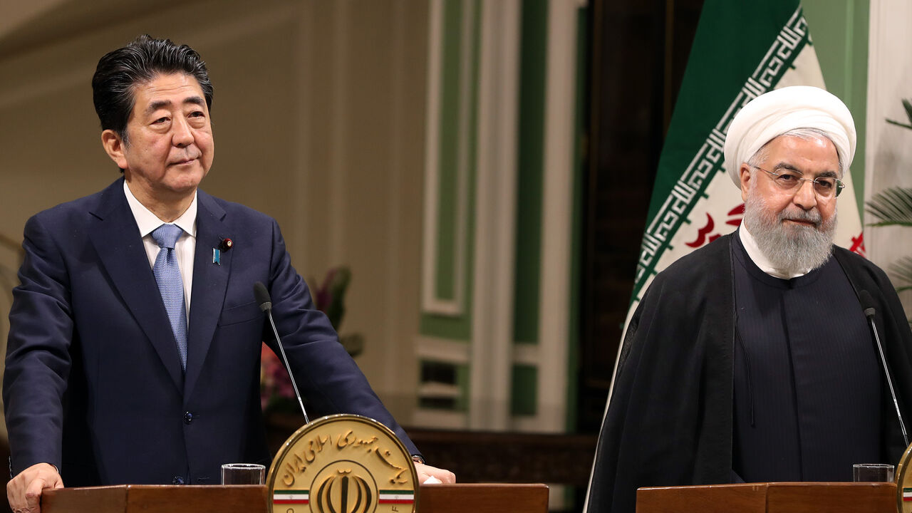 1149496784 Iranian President Hassan Rouhani (R) gives a joint press conference with the Japanese Prime Minister Shinzo Abe at the Saadabad Palace in the capital Tehran on June 12, 2019. - Japan's visiting Prime Minster Shinzo Abe called on Iran to play a "constructive role" for peace in the Middle East on Wednesday after meeting in Tehran with President Hassan Rouhani. (Photo by - / AFP) (Photo credit should read -/AFP/Getty Images)