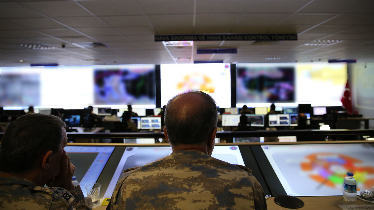 971899416 ESKISEHIR, TURKEY - JUNE 12: Turkish Chief of General Staff Hulusi Akar monitors the air operations towards Iraq's Qandil, Sinjar, Hakurk and Avasin-Basyan regions at Combined Air Operations Center in Eskisehir, Turkey on June 12, 2018. (Photo by Sarp Ozer/Anadolu Agency/Getty Images)