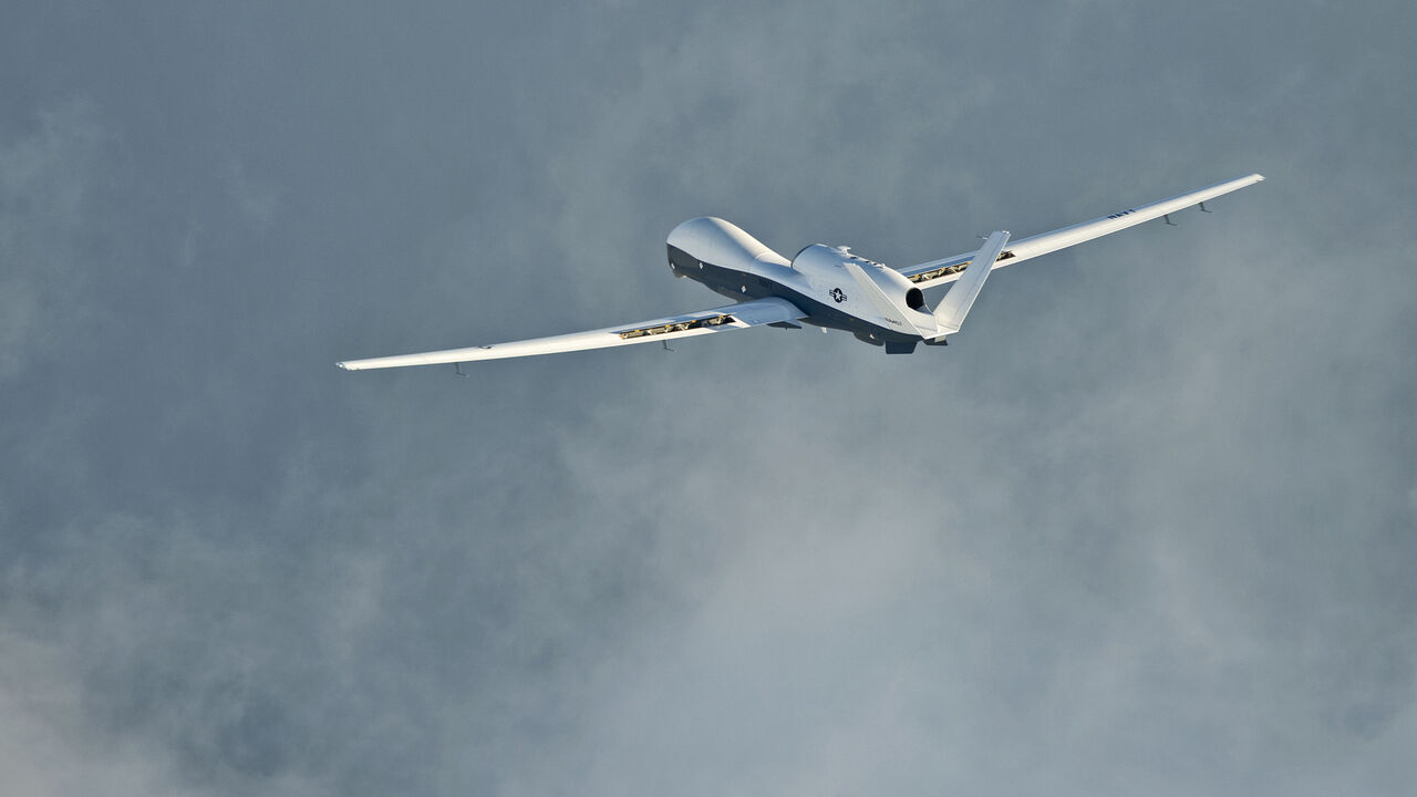 USA-NAVY/DRONES The MQ-4C Triton unmanned aircraft system completes its inaugural cross-country ferry flight at Naval Air Station Patuxent River, Maryland in this U.S. Navy photo taken September 18, 2014. The Pentagon's review of intelligence and surveillance programs should be completed by mid-October, which will help clarify the future of the Navy's proposed carrier-based unmanned spy plane, a senior Navy official said on Tuesday. REUTERS/U.S. Navy/Erik Hildebrandt/Handout (UNITED STATES - Tags: MILITARY) THIS IMAGE HAS