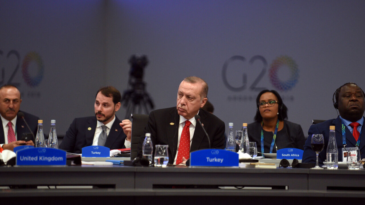 G20-ARGENTINA/PLENARY SESSION Turkish President Recep Tayyip Erdogan attends the plenary session at the G20 leaders summit in Buenos Aires, Argentina December 1, 2018. G20 Argentina/Handout via REUTERS ATTENTION EDITORS - THIS IMAGE WAS PROVIDED BY A THIRD PARTY. - RC1B008D34E0
