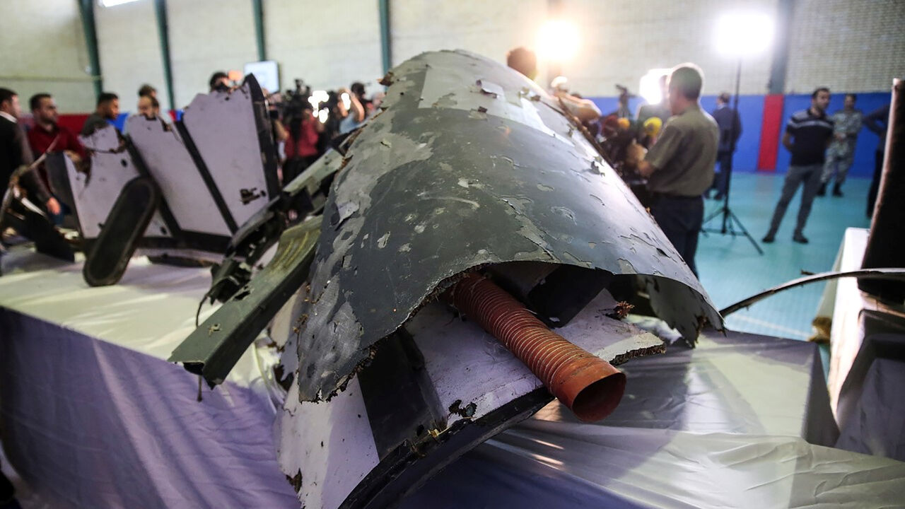 MIDEAST-IRAN/USA-DRONE The purported wreckage of the American drone is seen displayed by the Islamic Revolution Guards Corps (IRGC) in Tehran, Iran June 21, 2019. Tasnim News Agency/Handout via REUTERS ATTENTION EDITORS - THIS IMAGE WAS PROVIDED BY A THIRD PARTY. - RC1FEE5FE760