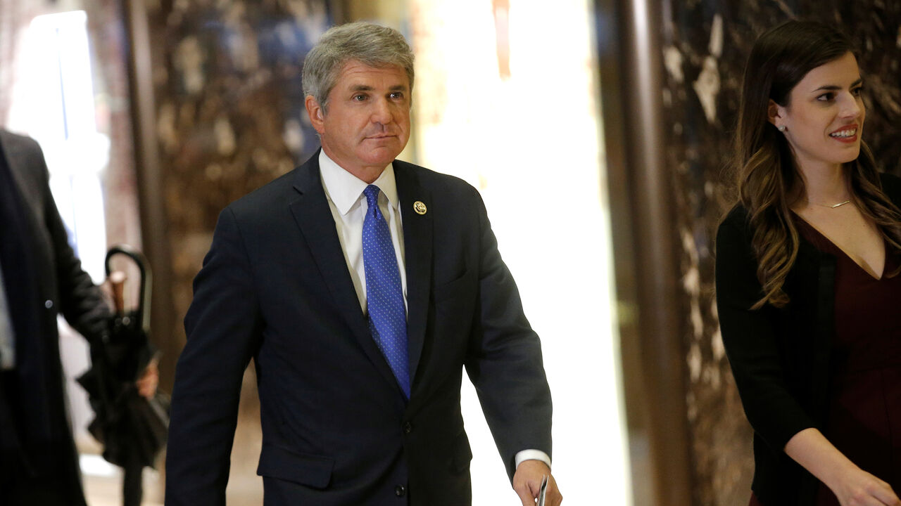 USA-TRUMP U.S. Representative Michael McCaul (R-TX) is escorted by Madeleine Westerhout (R) as he arrives at Trump Tower to meet with U.S. President-elect Donald Trump in New York, U.S., November 29, 2016. REUTERS/Mike Segar - RC1E37EFDFD0