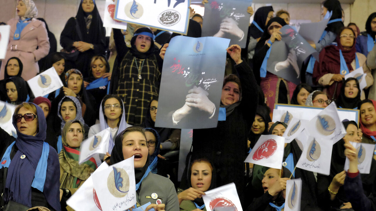 IRAN-ELECTION/ Iranian women holding electoral leaflets attend a reformist campaign for upcoming parliamentary election, in Tehran February 18, 2016. REUTERS/Raheb Homavandi/TIMA ATTENTION EDITORS - THIS IMAGE WAS PROVIDED BY A THIRD PARTY. FOR EDITORIAL USE ONLY. - GF10000314042