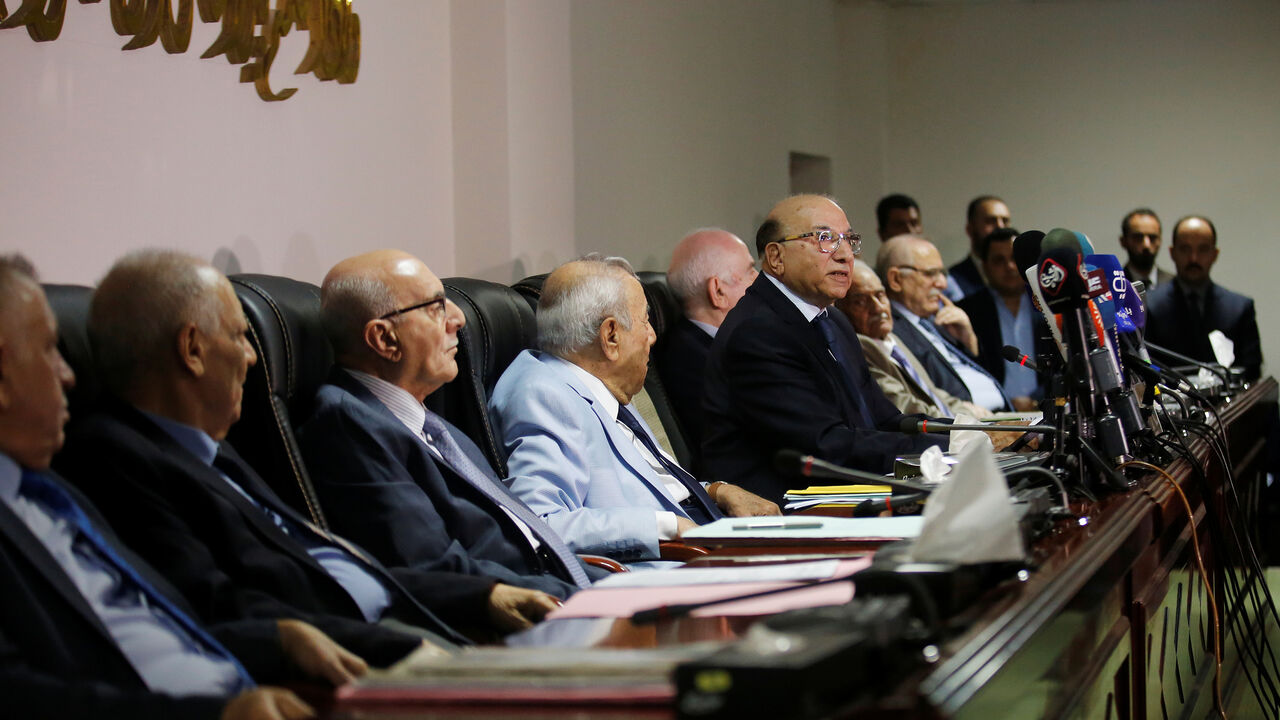 IRAQ-ELECTION/ Judge Medhat al-Mahmoud, presiding over the supreme federal court, reads a verdict on appeals concerning amendment of an election law in Baghdad, Iraq June 21, 2018. REUTERS/Abdullah Dhiaa al-Deen - RC134238AFB0