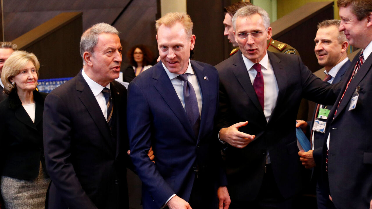 Turkey's Defence Minister Akar, U.S. Secretary of Defense Shanahan and NATO Secretary General Stoltenberg attend a NATO defence ministers meeting in Brussels Turkey's Defence Minister Hulusi Akar, U.S. Secretary of Defense Patrick Shanahan and NATO Secretary General Jens Stoltenberg attend a NATO defence ministers meeting at the Alliance headquarters in Brussels, Belgium February 13, 2019. REUTERS/Francois Lenoir - RC12887C8A40