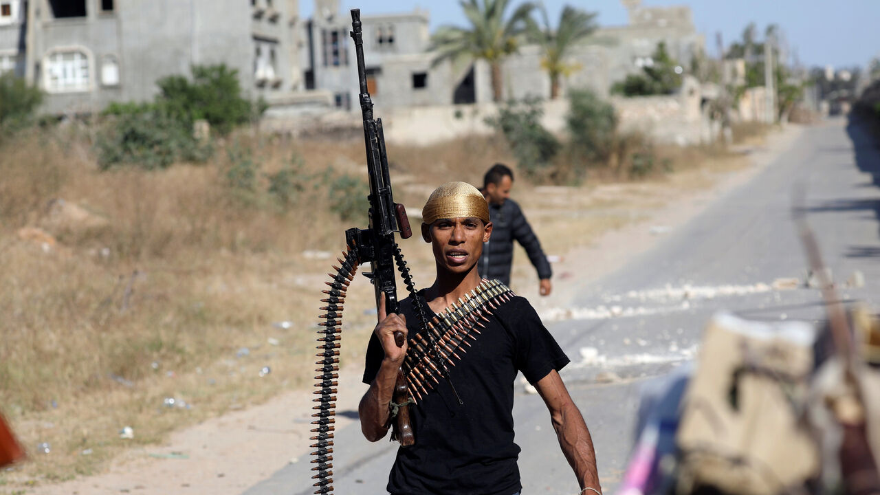 LIBYA-SECURITY/FRONTLINE A member of the Libyan internationally recognised government forces is seen during a fight with Eastern forces in al-Yarmouk south of Tripoli, Libya May 7, 2019. REUTERS/Hani Amara - RC1BBD718D70