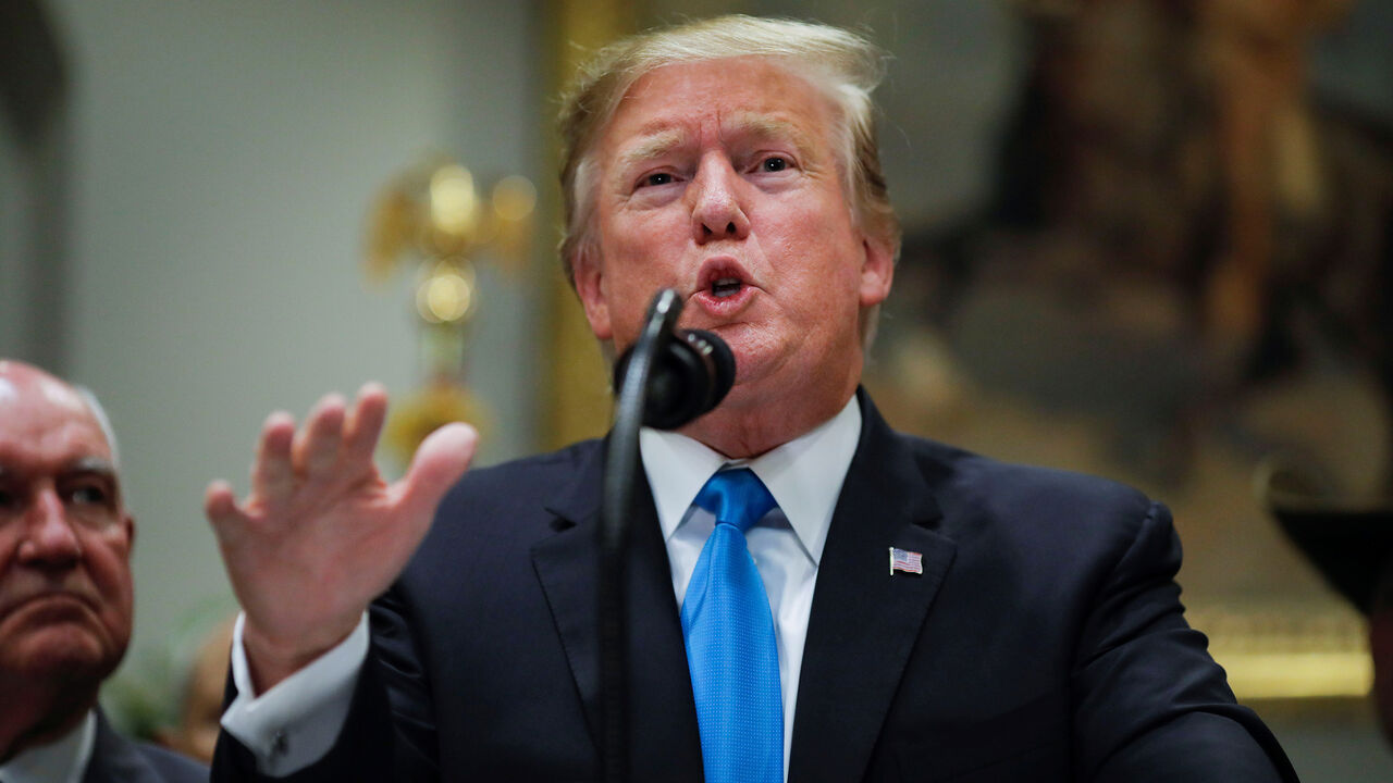 USA-TRUMP/CONGRESS U.S. President Donald Trump speaks to reporters about a range of issues as Secretary of Agriculture Sonny Perdue looks on during an event devoted to "America's farmers and ranchers" in the Roosevelt Room of the White House in Washington, U.S., May 23, 2019. REUTERS/Carlos Barria - RC131BDDFC60