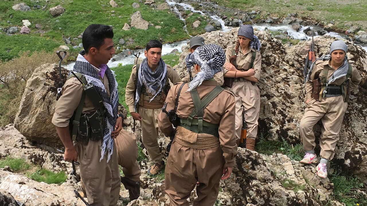 682674556 The Democratic Party of Iranian Kurdistan's (PDKI) armed wing, known as the Iranian peshmerga, located in the border near Iran continue their armed struggle against the Iranian government. They consider themselves Socialist Democrats The group practices daily training in the mountains and a nearby trading facility. The PDKi are an armed group who are trying to attain national rights within Iran. As of today Kurds who live in Iran continue under the Iranian government to have the freedom and rights that othe