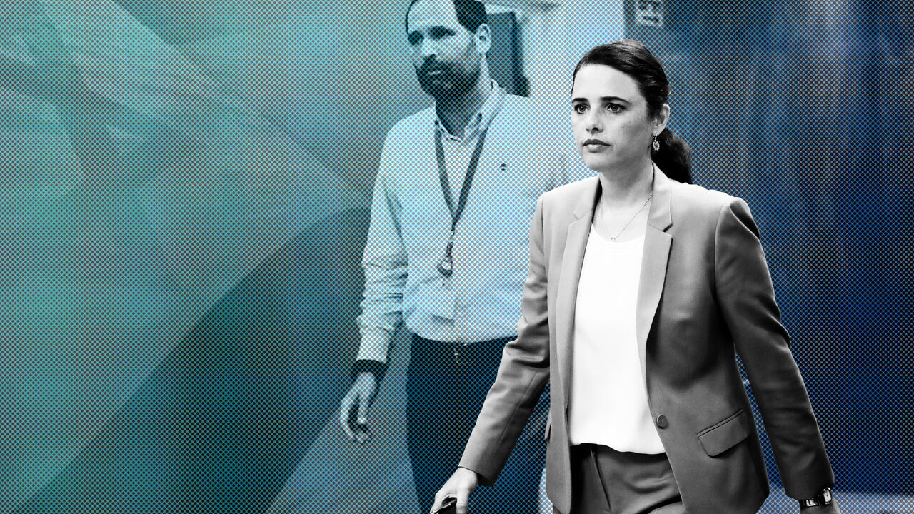 ISRAEL-POLITICS/ Israeli minister of Justice Ayelet Shaked (R) arrives ahead of the weekly cabinet meeting at the Prime Minister's office in Jerusalem September 12, 2018. Thomas Coex/Pool via Reuters - RC1589D288D0