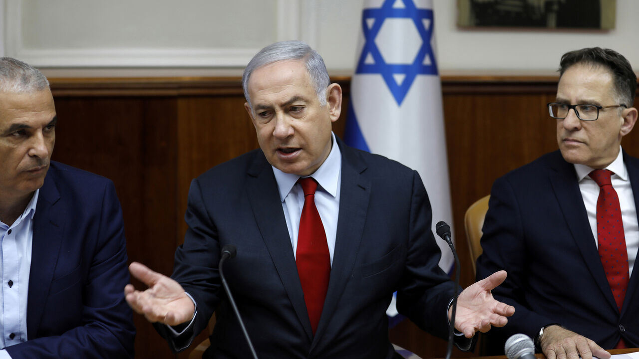 ISRAEL-POLITICS/ Israeli Prime Minister Benjamin Netanyahu, Cabinet Secretary Tzachi Braverman and Finance Minister Moshe Kahlon attend a weekly cabinet meeting in Jerusalem June 24, 2019. Menahem Kahana/Pool via REUTERS - RC17FDAEC320