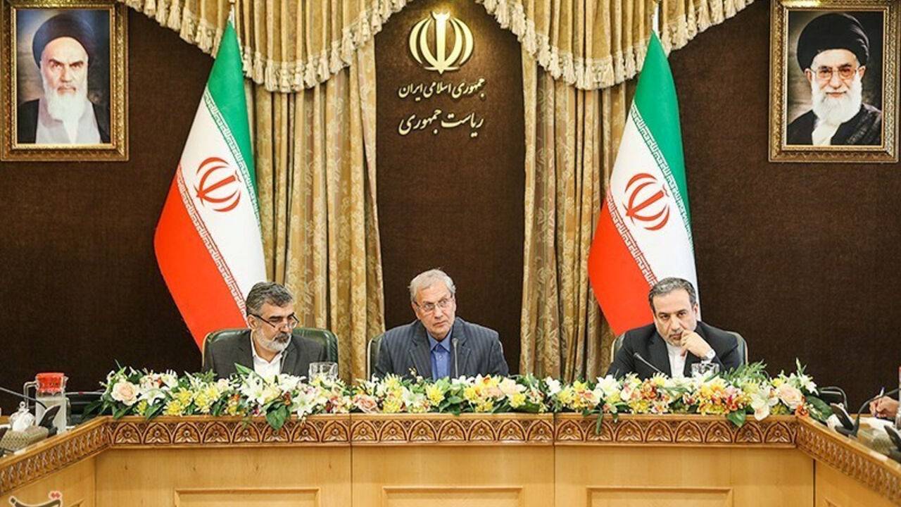 Abbas Araqchi, Iranian deputy foreign minister for political affairs, Behrouz Kamalvandi, Iran's Atomic Energy Organization spokesman and Iran's government spokesman Ali Rabiei attend a news conferenece in Tehran Abbas Araqchi, Iranian deputy foreign minister for political affairs (R), Behrouz Kamalvandi, Iran's Atomic Energy Organization spokesman (L) and Iran's government spokesman Ali Rabiei attend a news conferenece in Tehran, Iran July 7, 2019. Tasnim News Agency/Handout via REUTERS. THIS IMAGE HAS BEEN SUPPLIED BY A THIRD PARTY. - RC188882BBC0