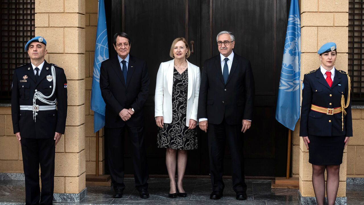 CYPRUS-LEADERS/UN Elizabeth Spehar, U.N. Special Representative of the Secretary-General and Head of UNFICYP Mission poses with Cyprus President Nicos Anastasiades and Turkish Cypriot leader Mustafa Akinci in the buffer zone of Nicosia airport, Cyprus February 26, 2019. Iakovos Hatzistavrou/Pool via REUTERS - RC1B589A8390