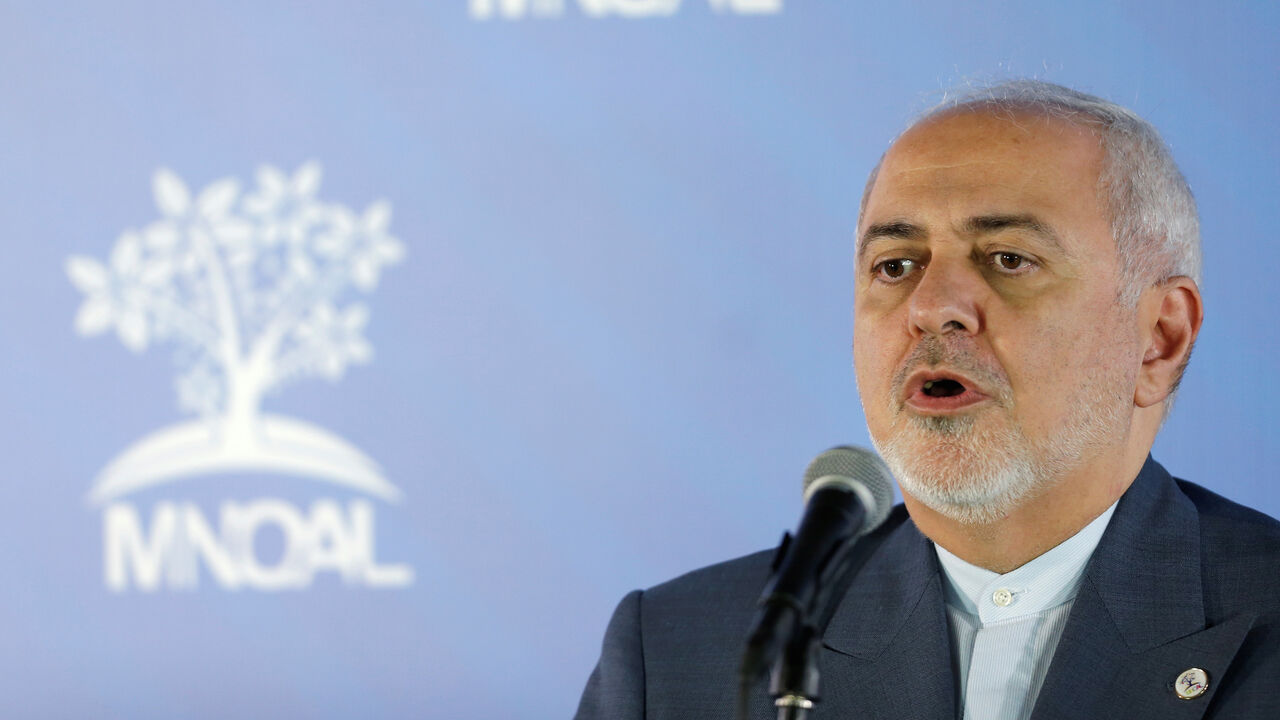 VENEZUELA-POLITICS/ Iran's Foreign Minister Mohammad Javad Zarif talks to the media during the Ministerial Meeting of the Non-Aligned Movement (NAM) Coordinating Bureau in Caracas, Venezuela July 20, 2019. REUTERS/Manaure Quintero - RC197678EF30
