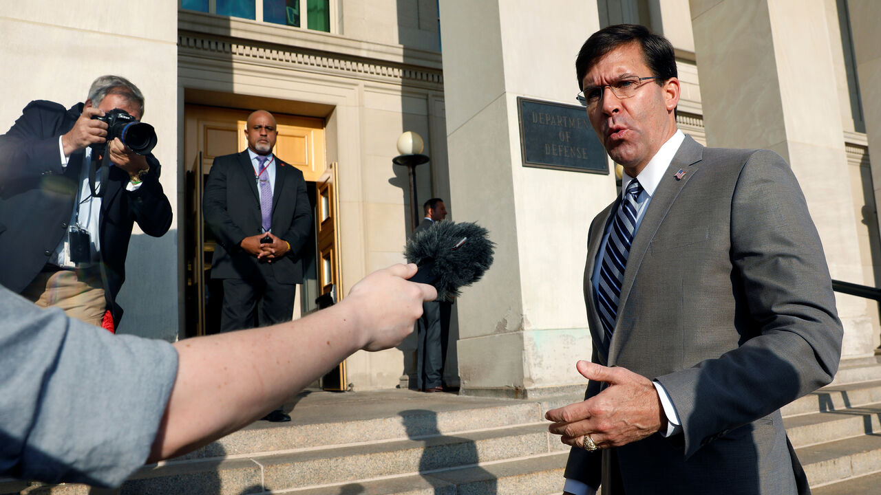 USA-DEFENSE/ESPER Mark Esper talks to reporters as he arrives for the first day on job as New U.S. Secretary of Defense at the Pentagon in Arlington, Virginia, U.S. July 24, 2019. REUTERS/Yuri Gripas - RC188D6C2000