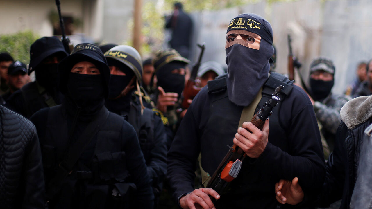 ISRAEL-PALESTINIANS/PROTESTS Islamic Jihad militants attend the funeral of Palestinian Jehad Hararah who was killed at the Israeli-Gaza border fence, in Gaza City March 23, 2019. REUTERS/Mohammed Salem - RC1B410D6340